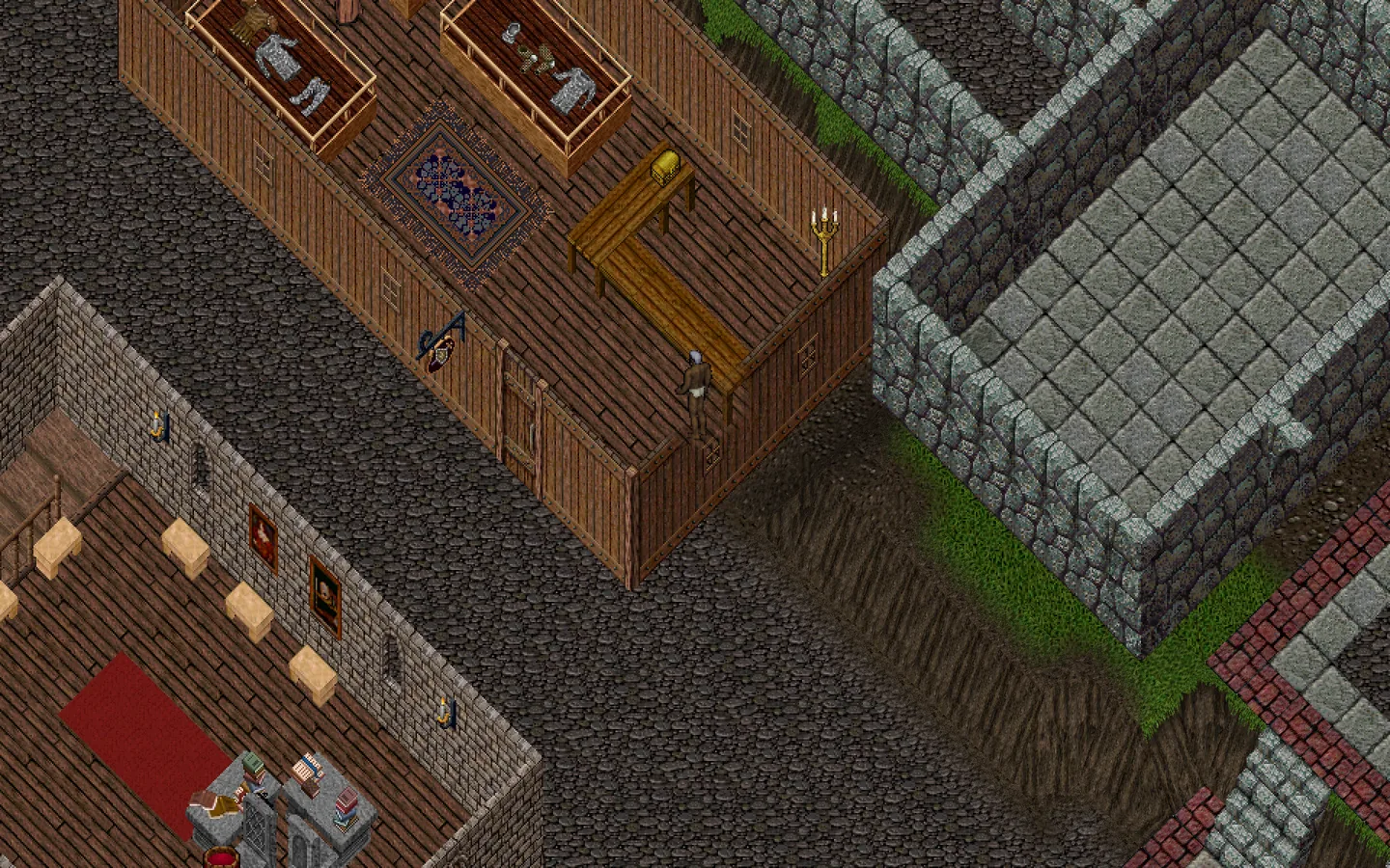 Una calle de Britain entre una tienda de madera y una casa de piedra, vista desde arriba