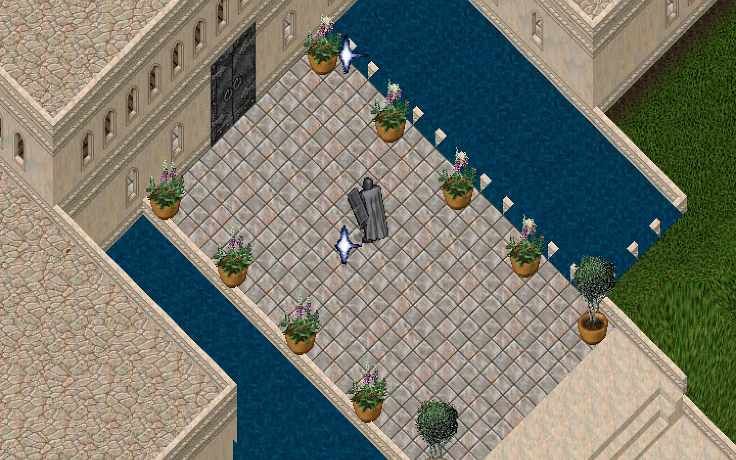 Un patio de losas claras entre dos estanques, con macetas en flor